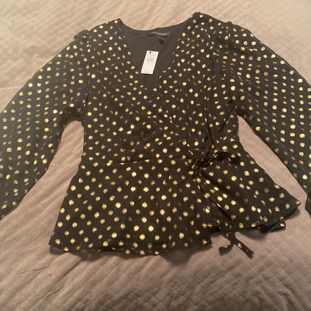 Sparkly polka dot wrap peplum top